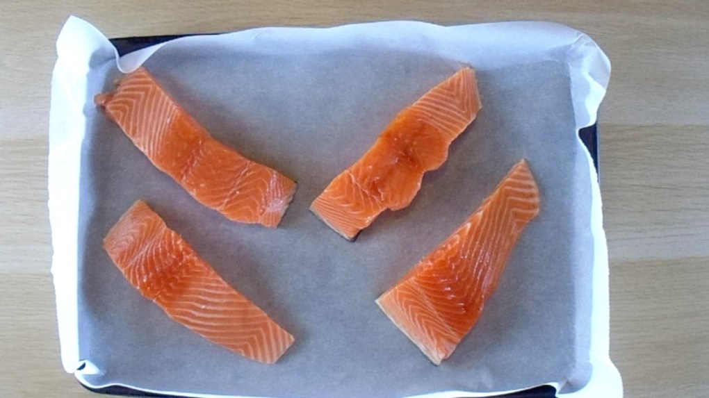 Place the salmon steak on a lined baking tray