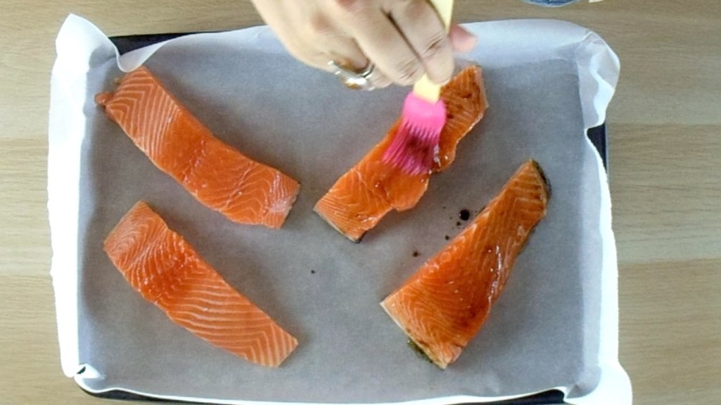 Brush the salmon with the oil mixture. 