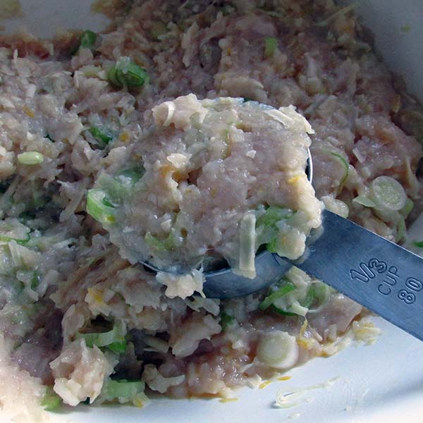 Use a measuring cup to portion out the burgers.