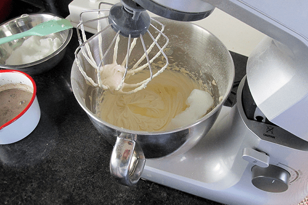 Fold the egg whites into the cheese mix