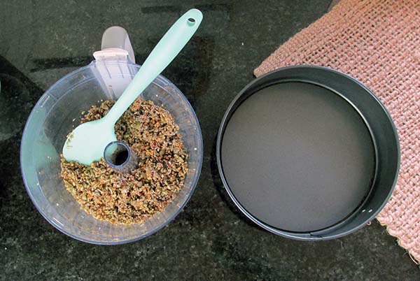 Spread the crunch mixture out in the bottom of a spring form cake tin