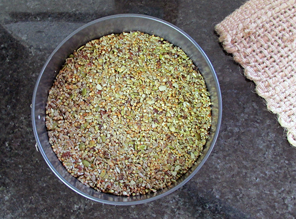 press it gently into the tin