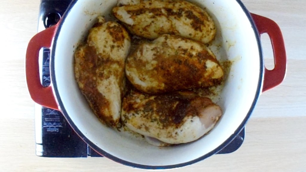 Sear both sides of the chicken.