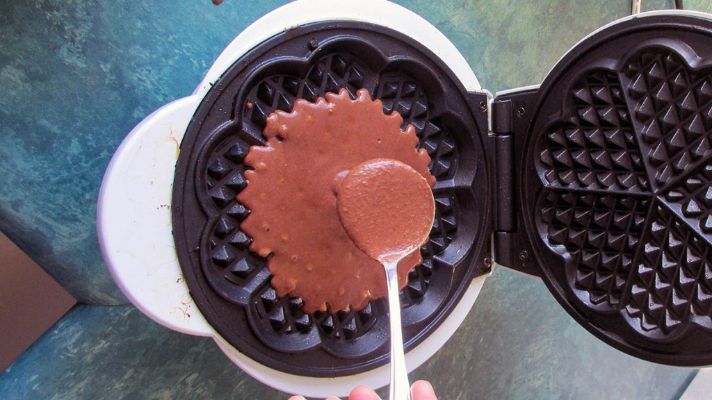 Add the batter to the waffle iron, use a tablespoon at a time. Don’t add too much and not too close to the edges.
