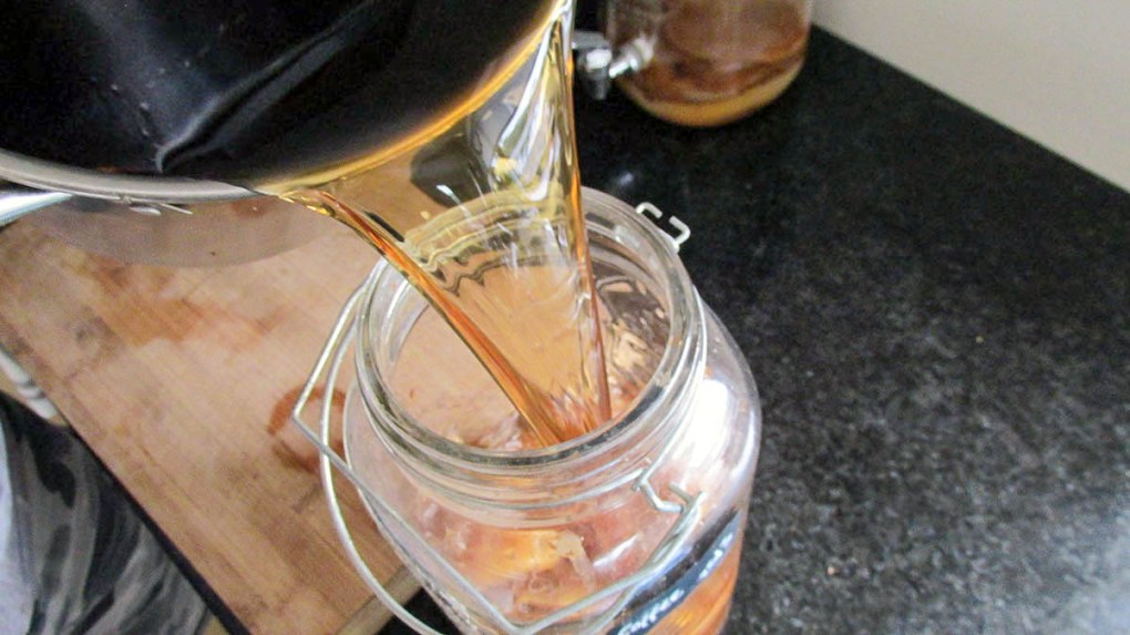 When the tea is at room temperature pour it into a jar or container