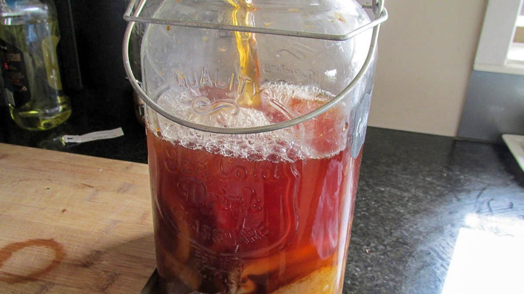 When the tea is at room temperature pour it into a jar or container