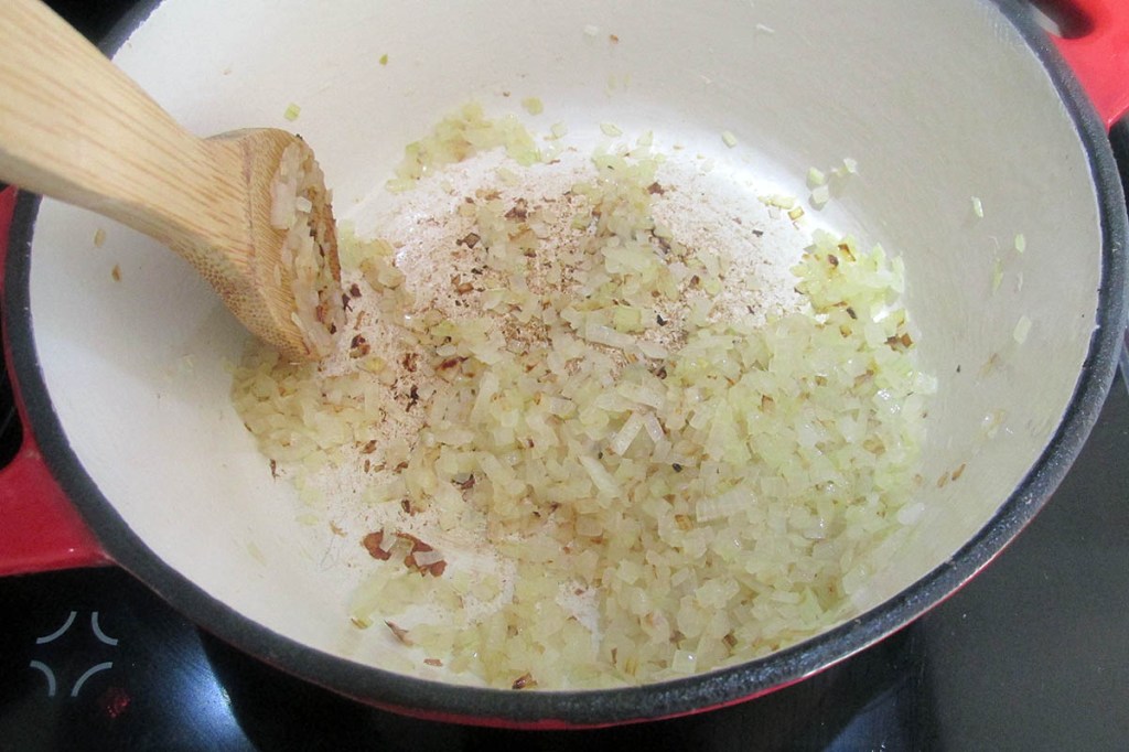Add the onion to a stockpot and cook until the onion starts to soften