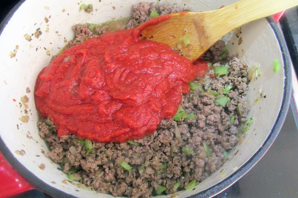 Add the chopped tomatoes to the pan