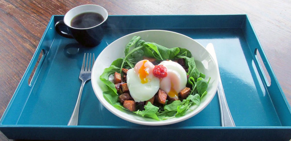 Fried potatoes and black coffee for breakfast