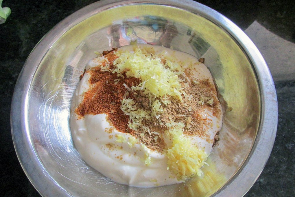 Add the garlic, lemon zest and juice to the bowl and mix well.