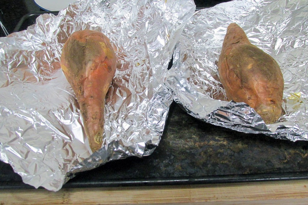 Take the baked potatoes from the oven