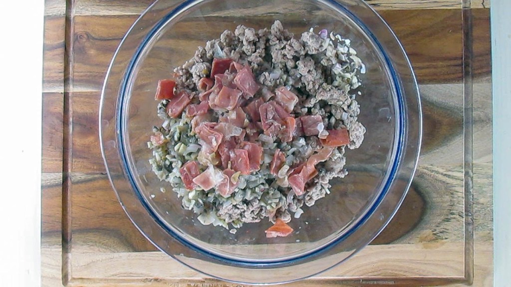 Add the prosciutto to the chicken.