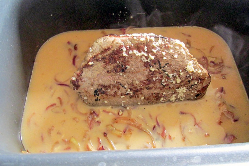 Cook the beef on a low heat setting for 6 to 8 hours.
