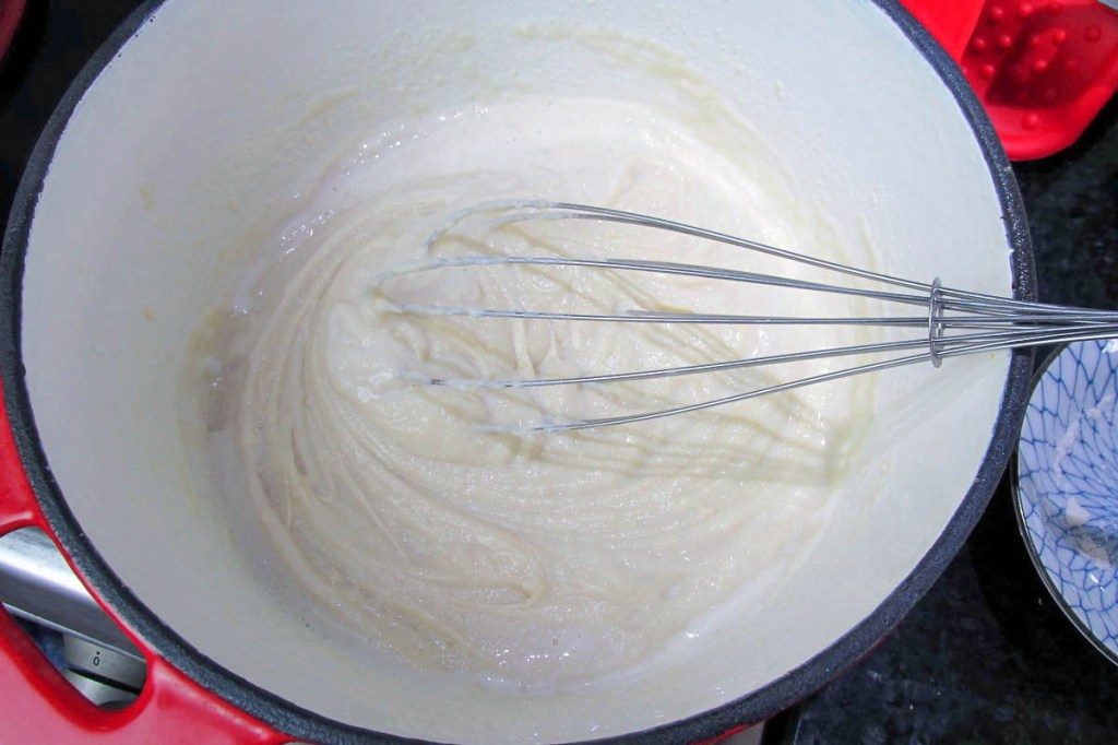 Slowly whisk in the milk. 