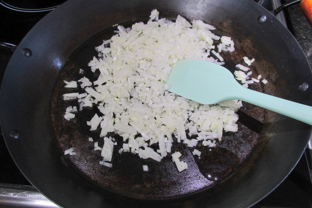 Add the onions to the pan.