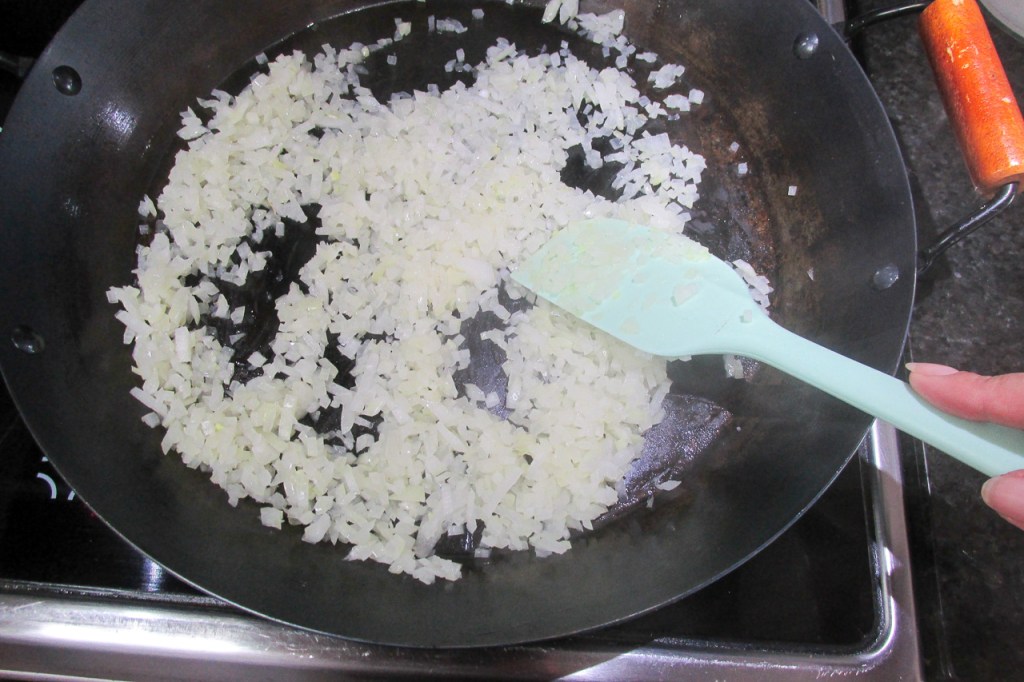 Add the onions to the pan.