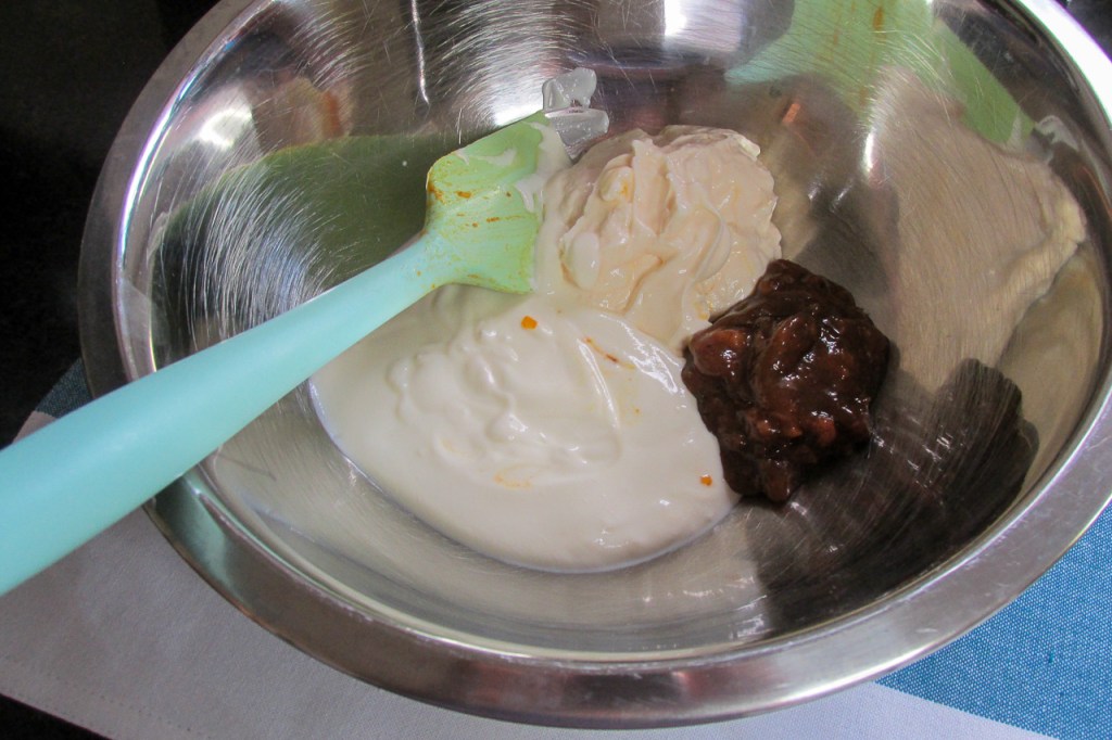 In another bowl add the mayo, yoghurt and chutney.