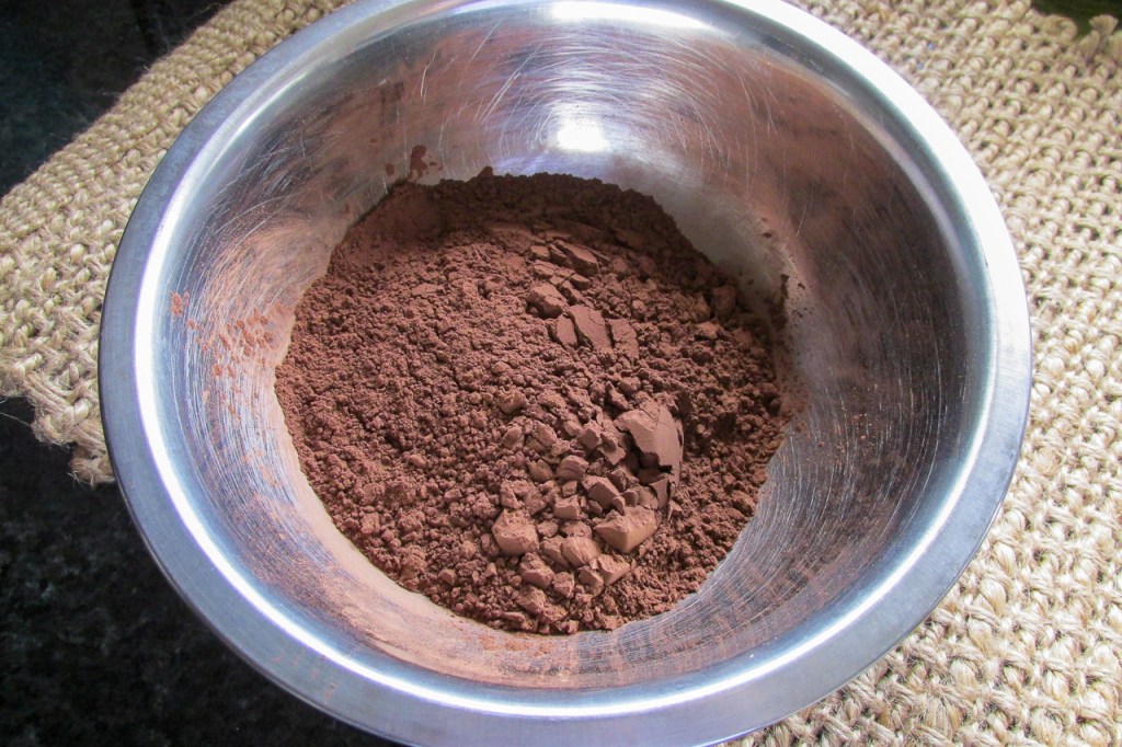 Place the cacao powder in a large bowl.