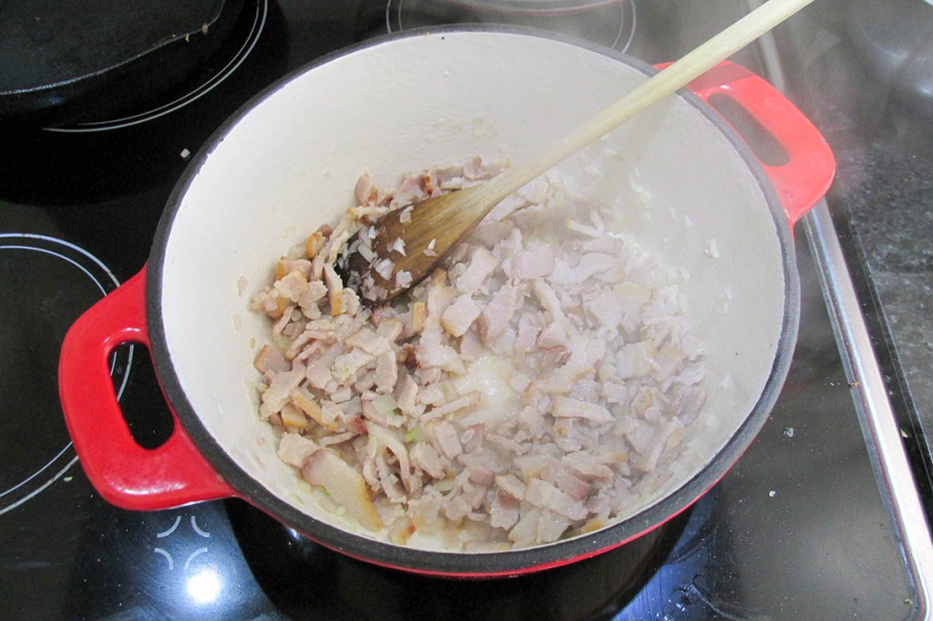 Sauté until the shallots start to colour.