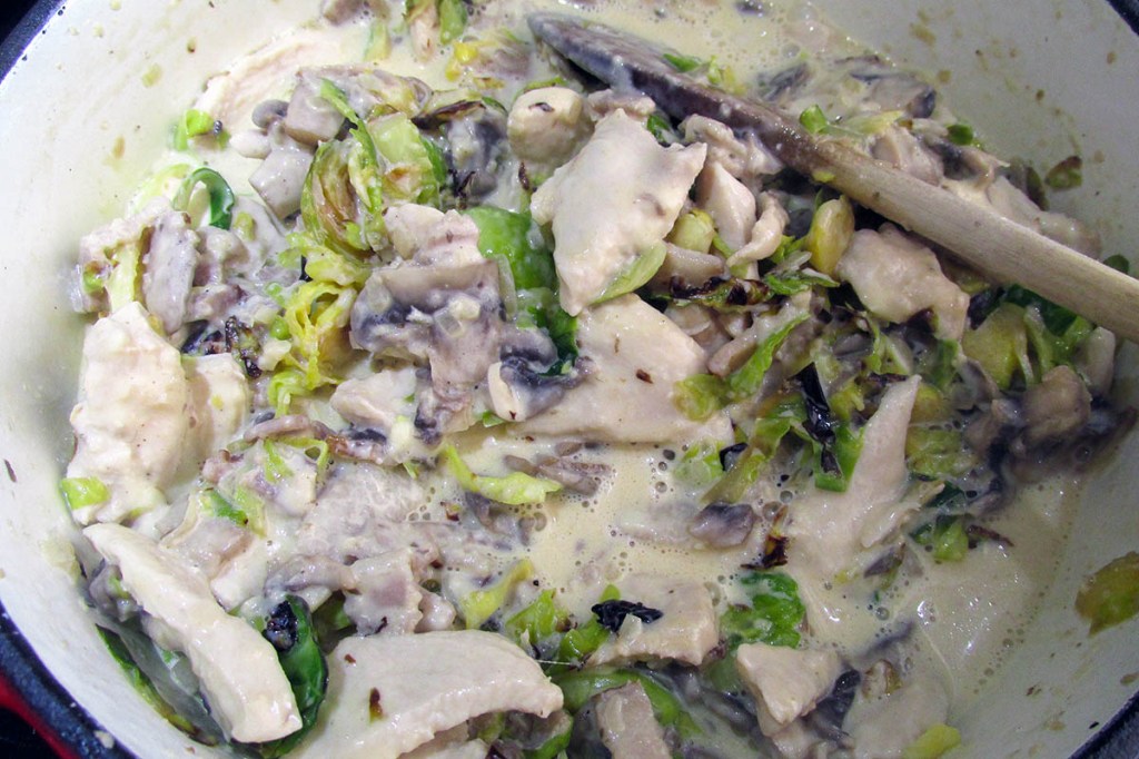 Mix well to coat all of the chicken and sprouts in the sauce.

