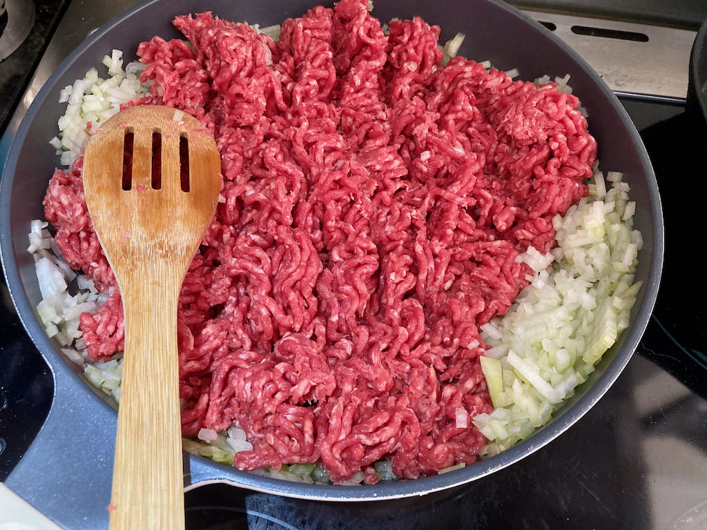 Cook until the meat has browned. 