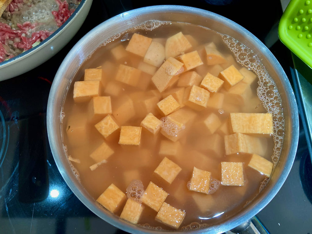 Cover the sweet potato with water.