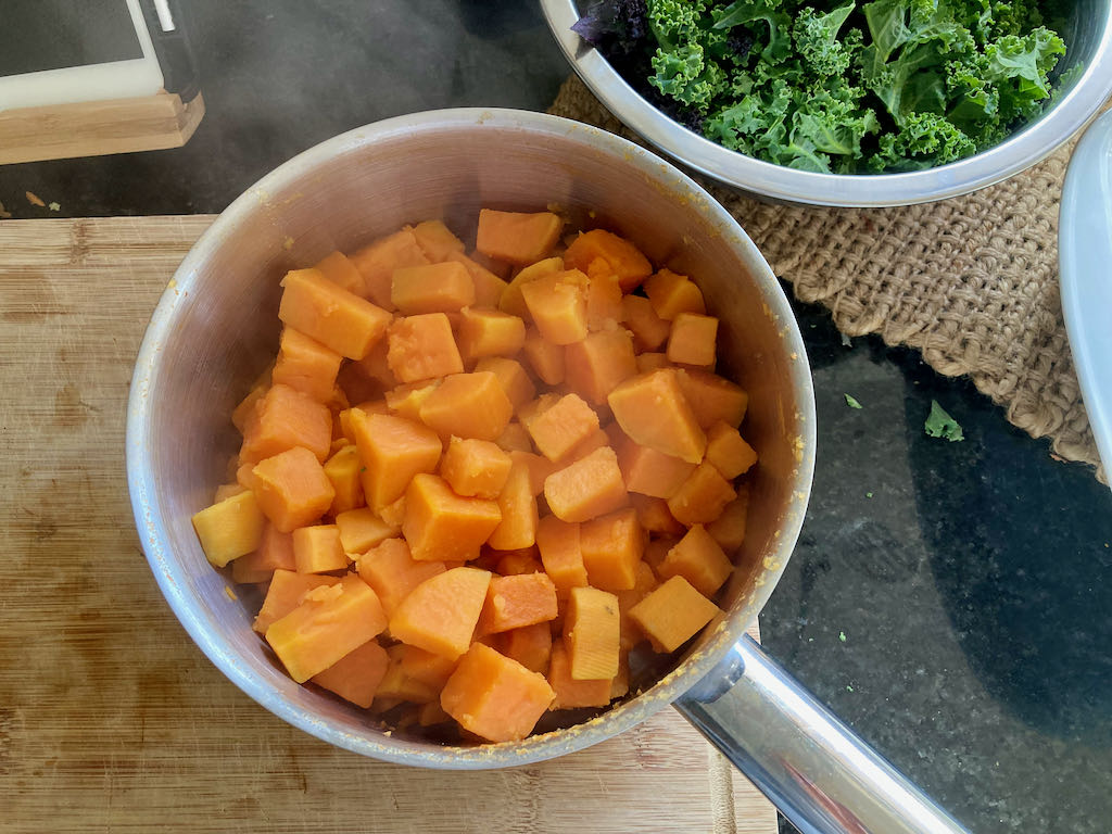 Place the sweet potatoes back in the saucepan