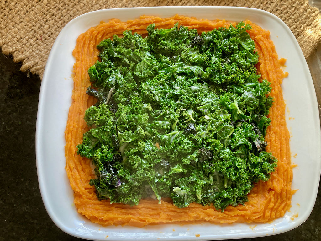 Add the creamed kale to the baking dish